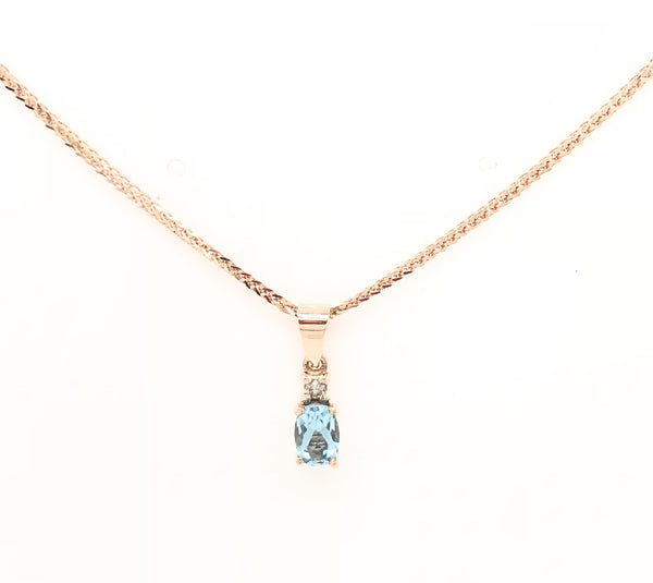 9CT ROSE GOLD PENDANT CLAW SET NATURAL OVAL BLUE TOPAZ AND BRILLIANT CUT DIAMOND HAND CRAFTED