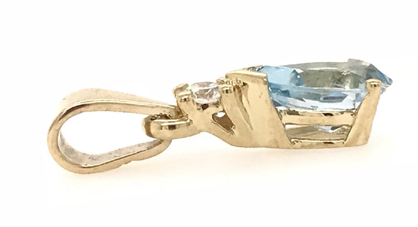 9CT YELLOW GOLD PENDANT CLAW SET NATURAL PEAR SHAPE BLUE TOPAZ AND BRILLIANT CUT DIAMOND HAND CRAFTED