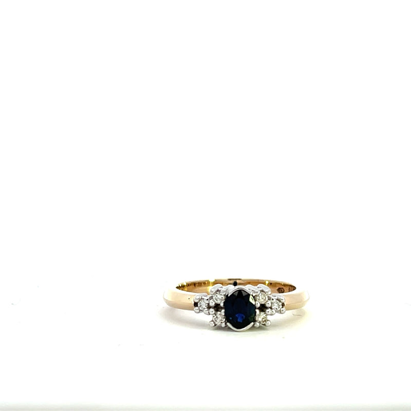 9CT YELLOW AND WHITE GOLD TRILOGY RING CLAW AND PART BEZEL SET NATURAL OVAL SAPPHIRES AND BRILLIANT CUT DIAMONDS HAND CRAFTED
