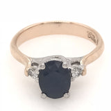 9CT YELLOW AND WHITE GOLD TRILOGY DRESS RING CLAW SET OVAL NATURAL BLUE SAPPHIRE AND BRILLIANT CUT DIAMONDS HAND CRAFTED
