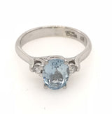 9CT WHITE GOLD TRILOGY DRESS RING CLAW SET OVAL CUT AQUAMARINE AND BRILLIANT CUT DIAMONDS HAND CRAFTED