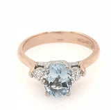 18CT ROSE AND WHITE GOLD TRILOGY RING OVAL CUT BLUE TOPAZ AND BRILLIANT CUT DIAMONDS HAND CRAFTED