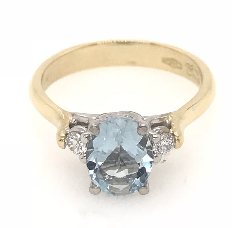 18CT YELLOW AND WHITE GOLD TRILOGY RING CLAW SET OVAL NATURAL AQUAMARINE AND BRILLIANT CUT DIAMONDS HAND CRAFTED