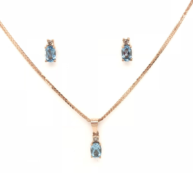 9CT ROSE GOLD PENDANT CLAW SET NATURAL OVAL BLUE TOPAZ AND BRILLIANT CUT DIAMOND HAND CRAFTED