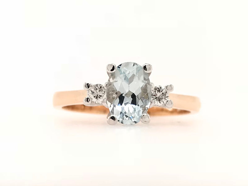 9CT ROSE AND WHITE GOLD TRILOGY RING NATURAL OVAL CUT AQUAMARINE AND BRILLIANT CUT DIAMONDS HAND CRAFTED