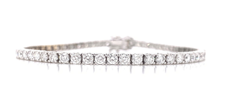 18CT WHITE GOLD TENNIS BRACELET CLAW SET BRILLIANT CUT DIAMONDS HAND CRAFTED