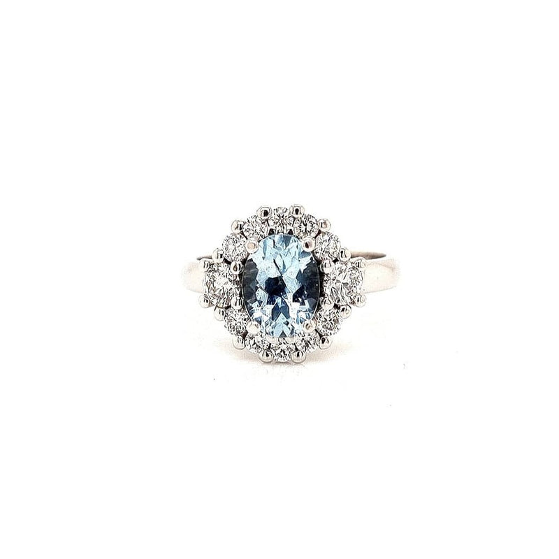 18CT WHITE GOLD HALO COCKTAIL RING CLAW SET OVAL CUT AQUAMARINE AND BRILLIANT CUT DIAMONDS HAND CRAFTED